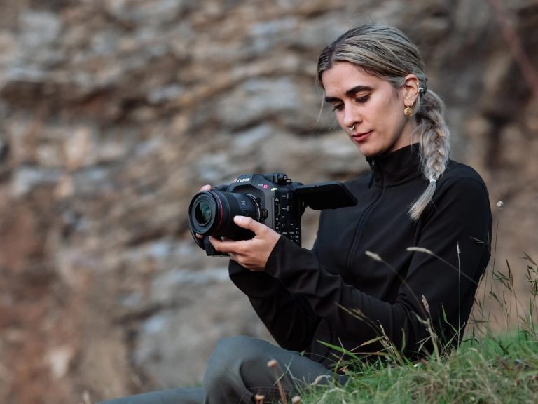 Image of a woman holding the new Canon C80